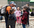 Седой старец Домбай и дети